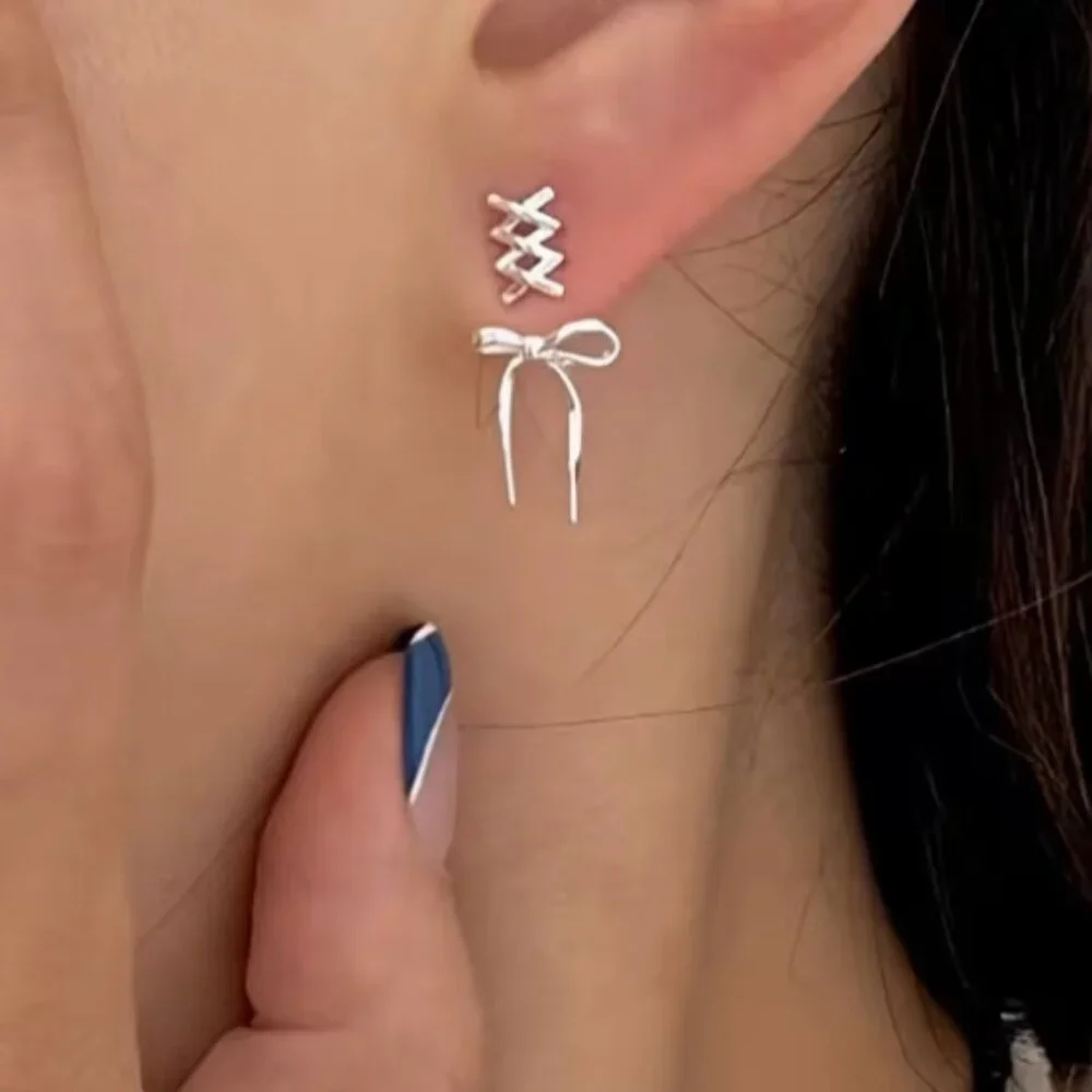 NEW - Bow Knot Silver earrings, criss cross stud earrings, bow jewelry - Picture 1 of 4